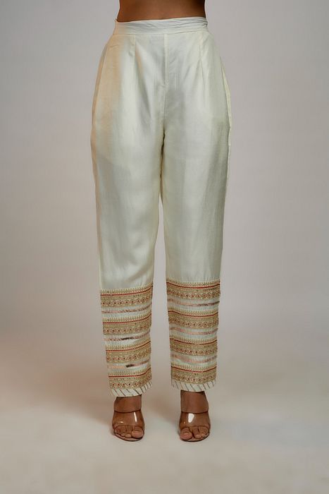 A model showcasing Golconda White Tahira Pant Set by Gopi Vaid from Gopi Vaid's collection