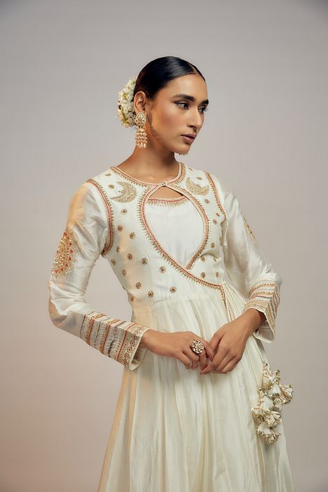 A model showcasing Golconda White Meera Anarkali Set by Gopi Vaid from Gopi Vaid's collection