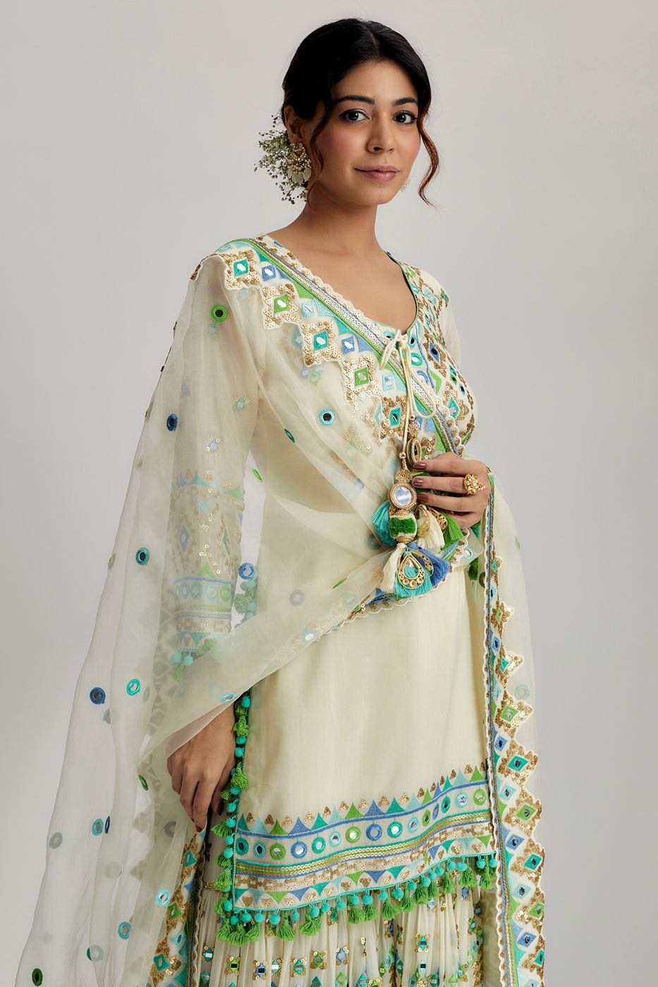 A model showcasing Ivory Friya Short Kurta Sharara Set Feature image by Gopi Vaid from Gopi Vaid's collection