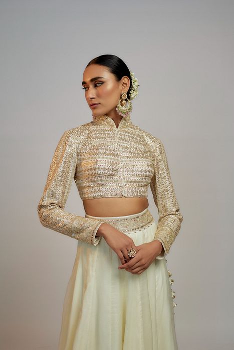 A model showcasing Golconda White Shaziya Skirt Set by Gopi Vaid from Gopi Vaid's collection