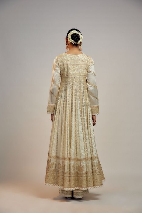 A model showcasing Golconda White Suhana Angrakha Set by Gopi Vaid from Gopi Vaid's collection