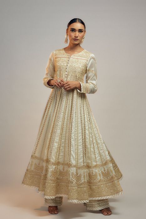 A model showcasing Golconda White Suhana Angrakha Set by Gopi Vaid from Gopi Vaid's collection