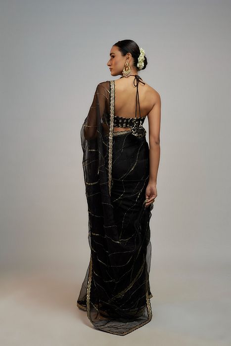A model showcasing Golconda Black Rida Saree Set by Gopi Vaid from Gopi Vaid's collection