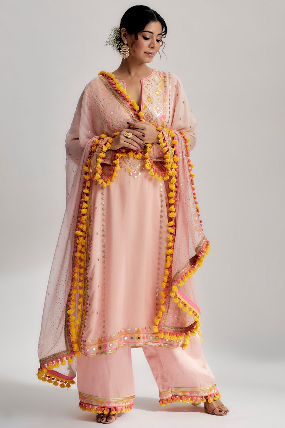 A model showcasing Pink Nishika Long Kurta With Palazzo Feature image by Gopi Vaid from Gopi Vaid's collection