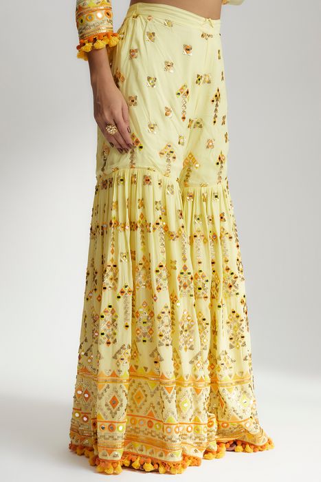 A model showcasing Yellow Sophie Peplum With Sharara Set by Gopi Vaid from Gopi Vaid's collection
