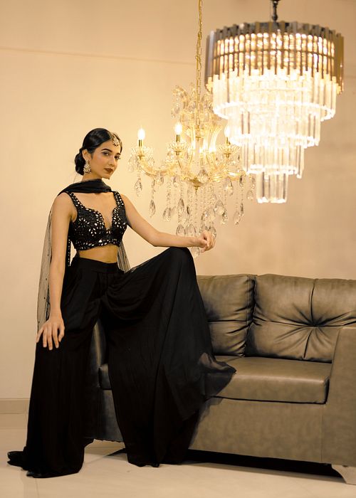 A model showcasing Black Pant Dupatta Set by Foram Patel from Foram Patel's collection