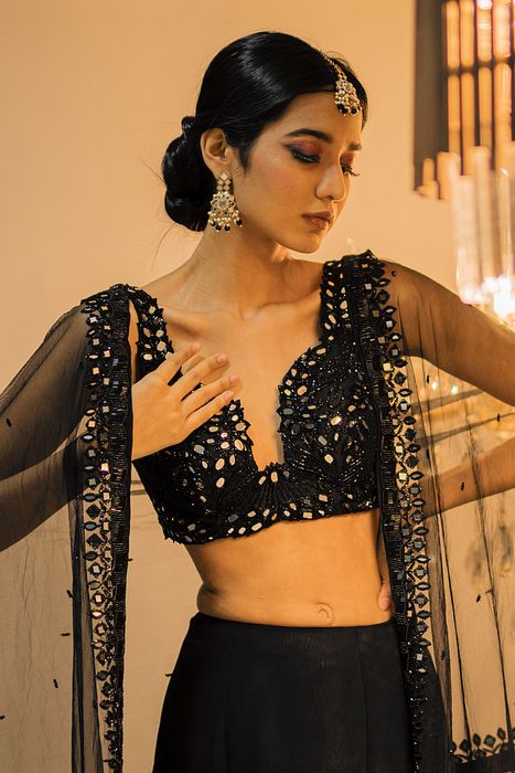 A model showcasing Black Pant Dupatta Set by Foram Patel from Foram Patel's collection