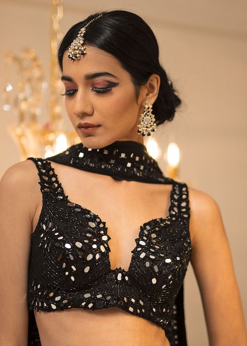 A model showcasing Black Pant Dupatta Set by Foram Patel from Foram Patel's collection