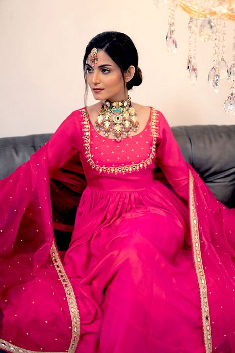 A model showcasing Magenta Gathered Kurta Set by Foram Patel from Foram Patel's collection