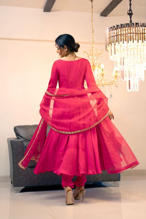 A model showcasing Magenta Gathered Kurta Set by Foram Patel from Foram Patel's collection