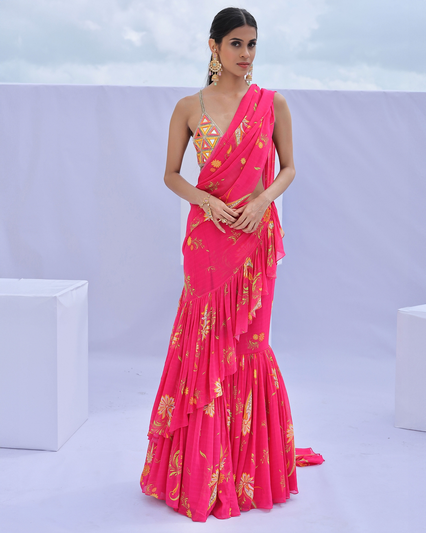 A model showcasing Pink Predraped Ruffle Paisley Print Saree Set Feature image by Foram Patel from Foram Patel's collection