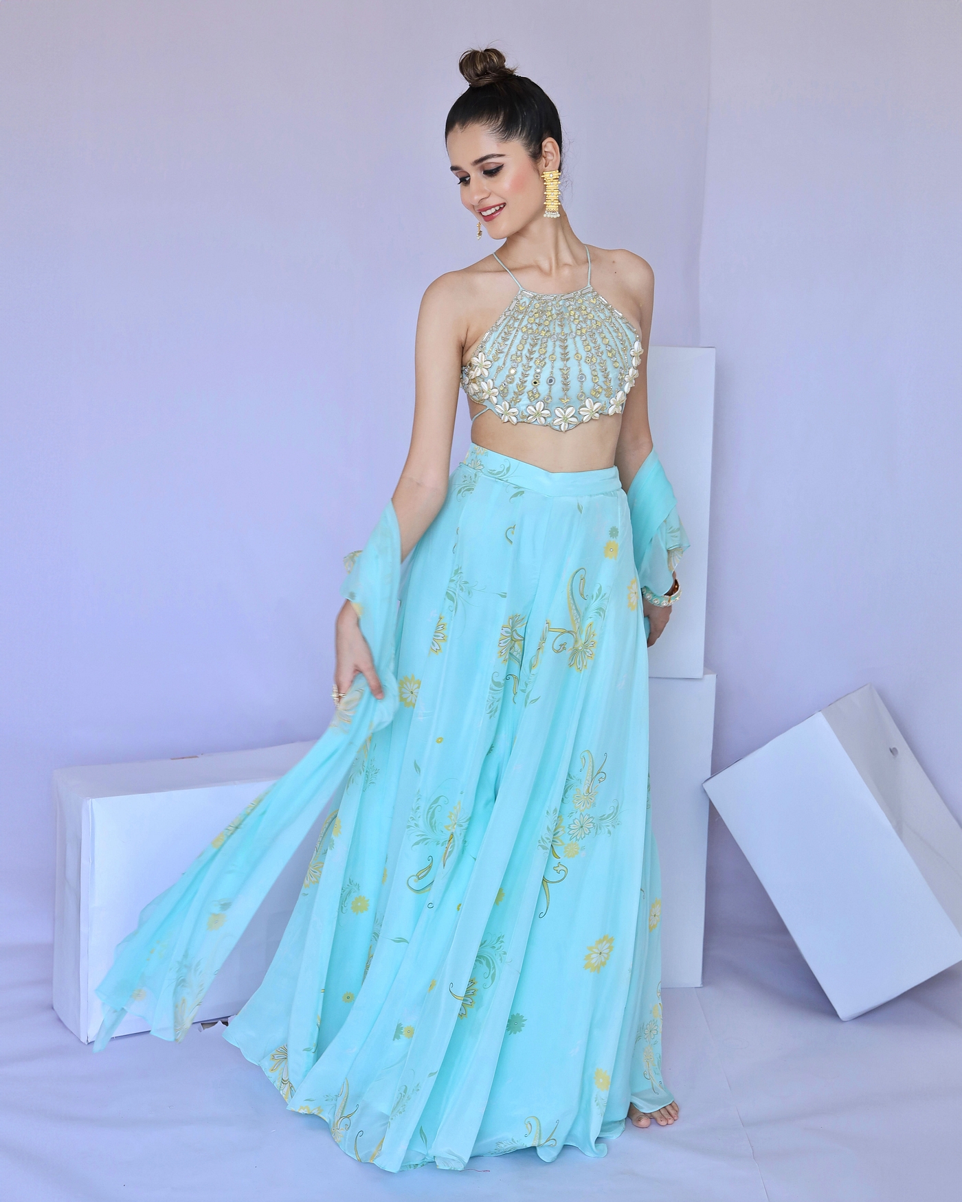 A model showcasing Blue Cowrie Embroidered Sharara Dupatta Set Feature image by Foram Patel from Foram Patel's collection