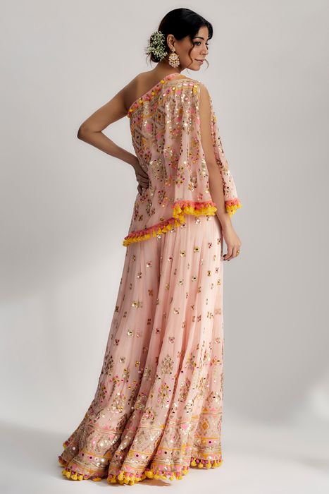 A model showcasing Pink Kaveer Flared Pants Set by Gopi Vaid from Gopi Vaid's collection