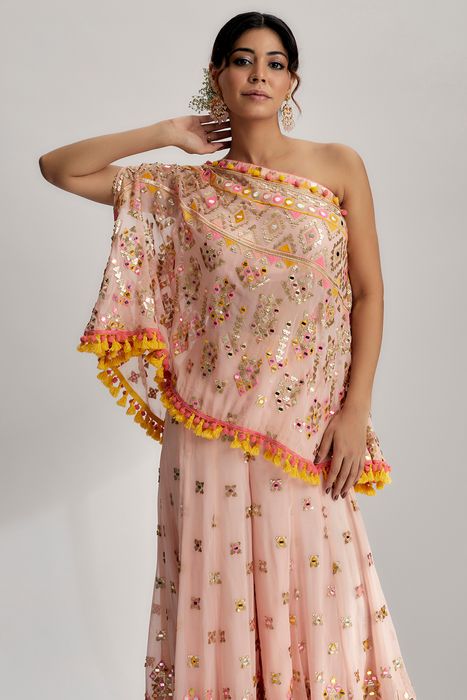 A model showcasing Pink Kaveer Flared Pants Set by Gopi Vaid from Gopi Vaid's collection