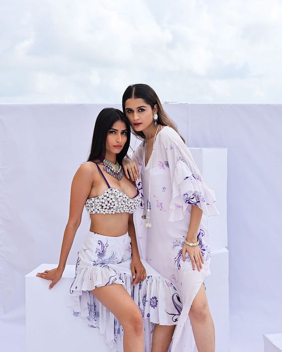 A model showcasing White Paisley Print Kaftan by Foram Patel from Foram Patel's collection