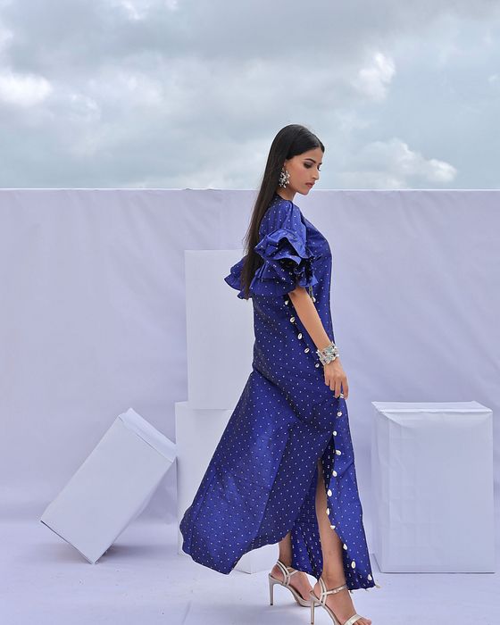 A model showcasing Electric Blue Brocade Kaftan by Foram Patel from Foram Patel's collection