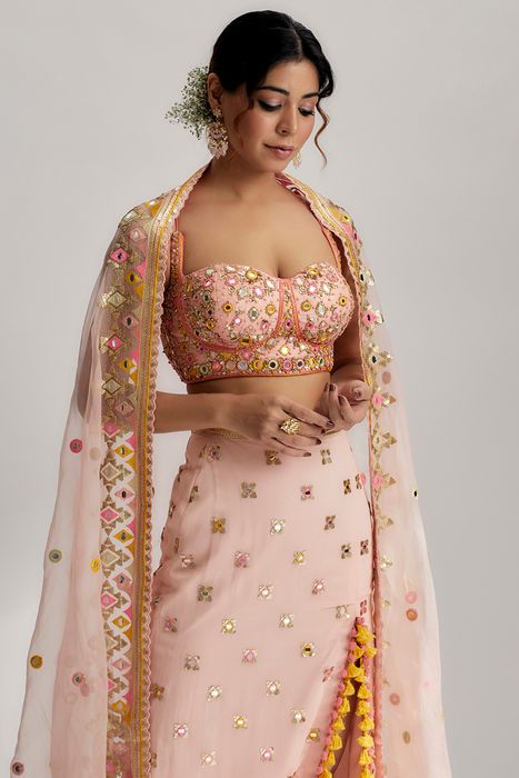 A model showcasing Arari Skirt Set In Pink by Gopi Vaid from Gopi Vaid's collection