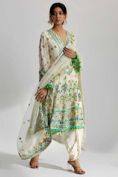 A model showcasing Priyal Dhoti Set In Ivory by Gopi Vaid from Gopi Vaid's collection