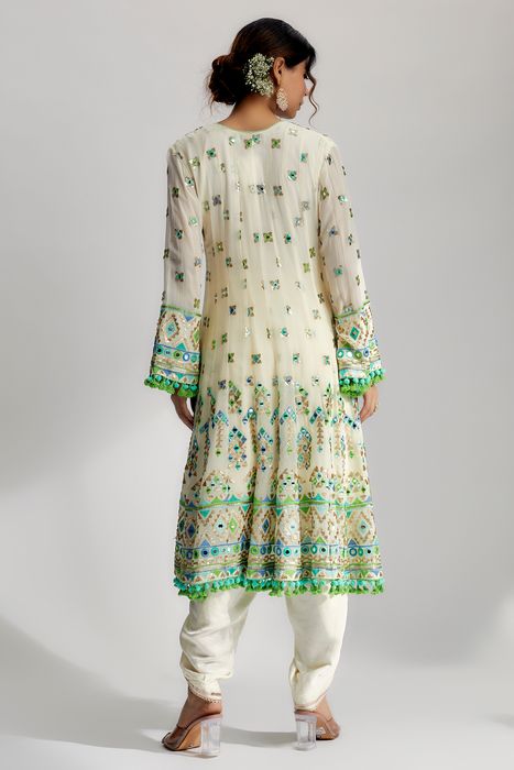 A model showcasing Priyal Dhoti Set In Ivory by Gopi Vaid from Gopi Vaid's collection