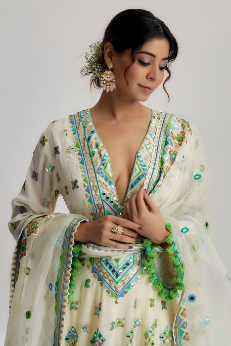 A model showcasing Priyal Dhoti Set In Ivory by Gopi Vaid from Gopi Vaid's collection
