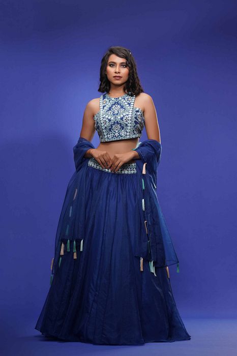 A model showcasing Blue Racer Blouse With Lehenga by Shruti S Label from Shruti S Label's collection
