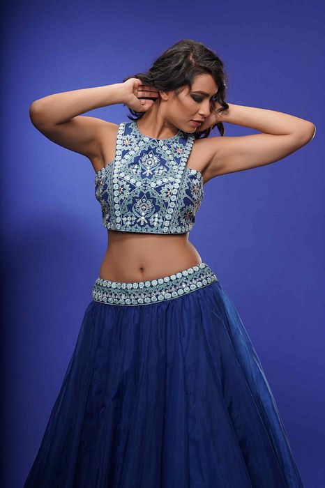 A model showcasing Blue Racer Blouse With Lehenga by Shruti S Label from Shruti S Label's collection