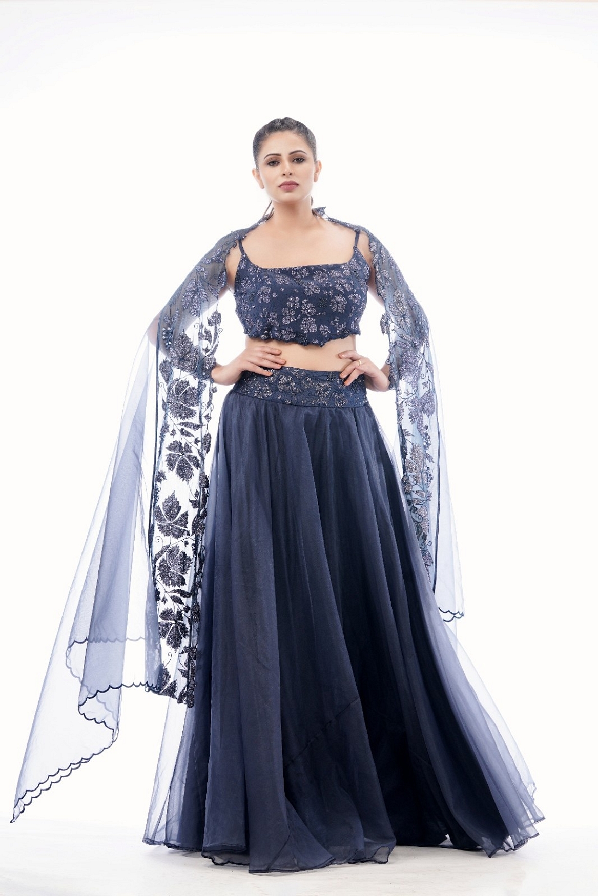 A model showcasing Grey Grapewine Cutwork Blouse N Dupatta With Organza Lehenga Feature image by Shruti S Label from Shruti S Label's collection
