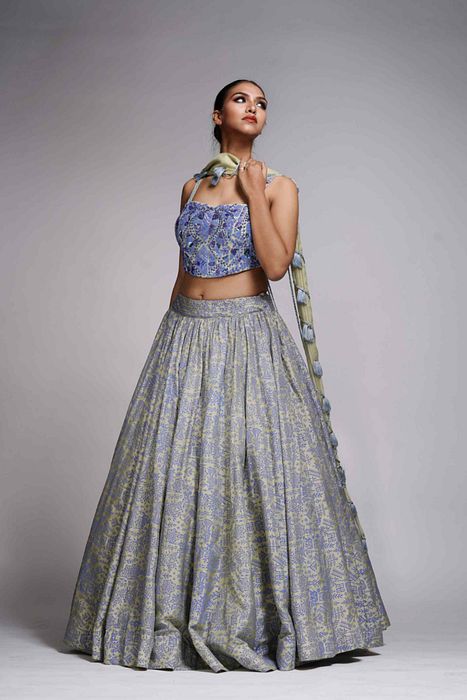 A model showcasing Green Bohemian Handpainted Lehenga by Shruti S Label from Shruti S Label's collection
