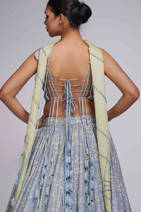 A model showcasing Green Bohemian Handpainted Lehenga by Shruti S Label from Shruti S Label's collection