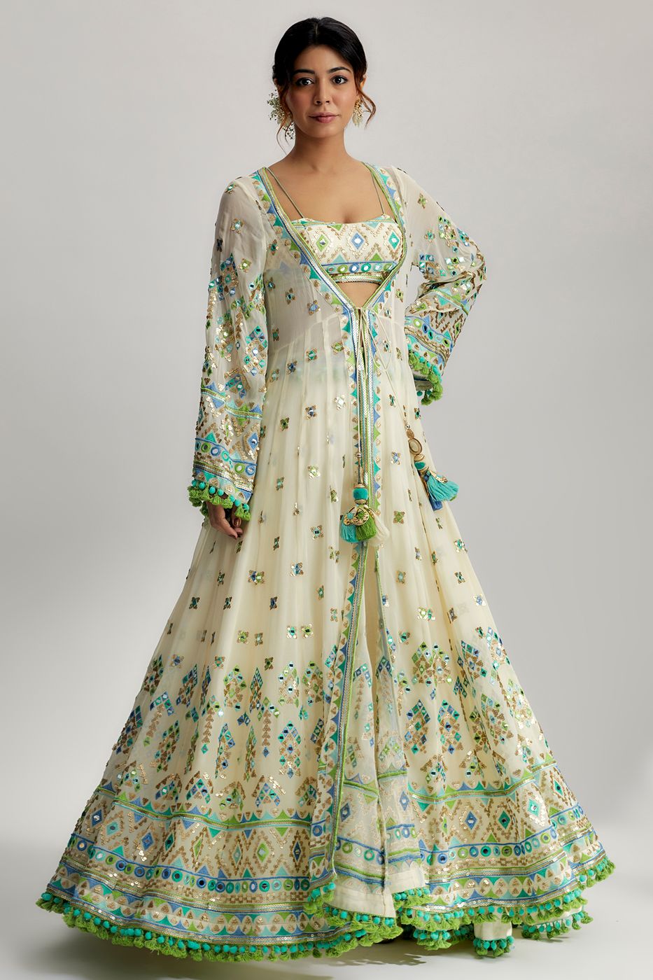 A model showcasing Ridham Jacket Set With Victorian Skirt In Ivory Feature image by Gopi Vaid from Gopi Vaid's collection