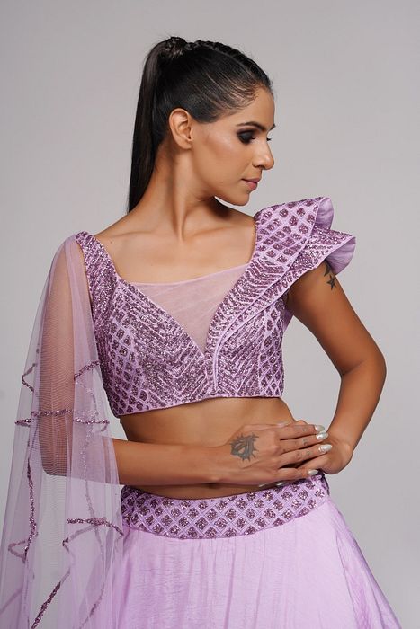 A model showcasing Lilac Lehenga Gown For Cocktail Sangeet by Shruti S Label from Shruti S Label's collection