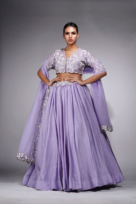 A model showcasing Lavender Lehenga With White Embroidery by Shruti S Label from Shruti S Label's collection