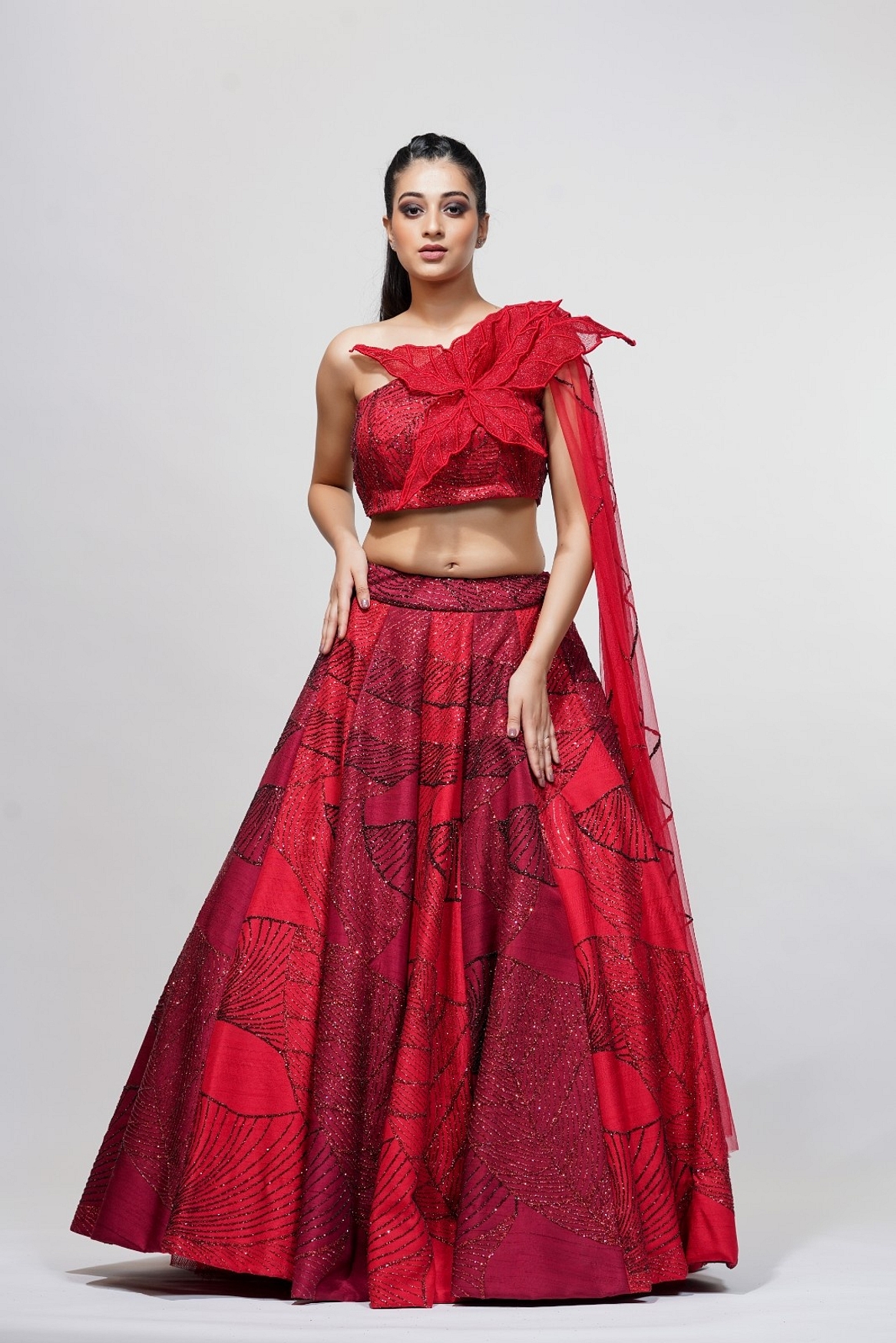 A model showcasing Leaves Red Lehenga Gown Feature image by Shruti S Label from Shruti S Label's collection