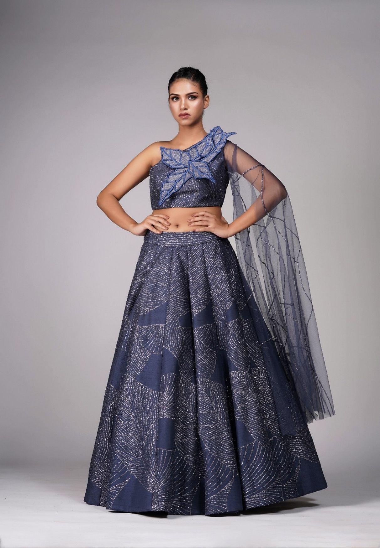 A model showcasing Leaves Blue Lehenga Gown Feature image by Shruti S Label from Shruti S Label's collection