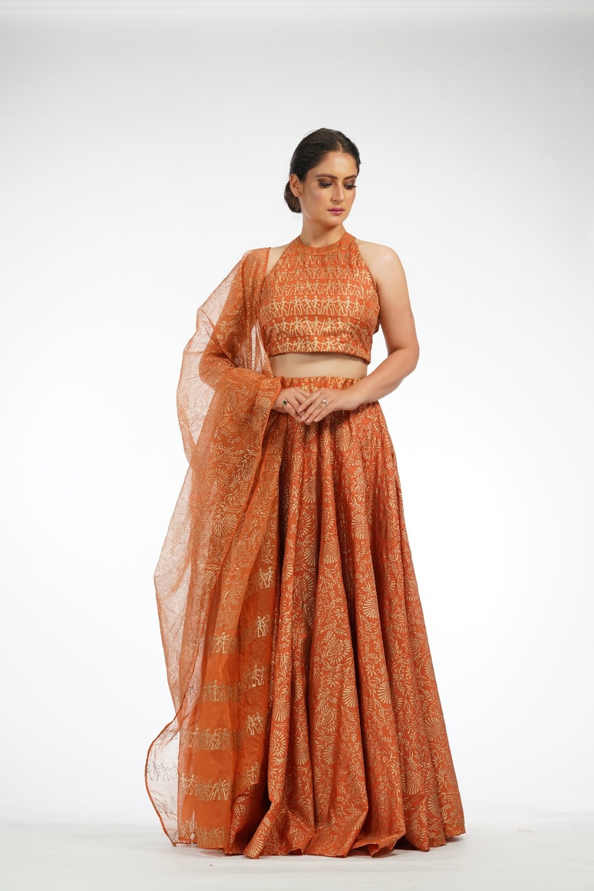 A model showcasing Burnt Orange Metallic Hand Painted Lehenga Feature image by Shruti S Label from Shruti S Label's collection