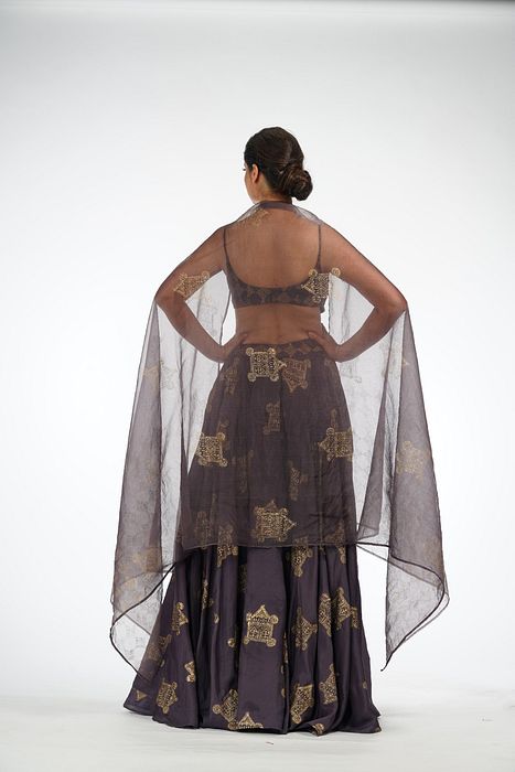 A model showcasing Metallic Hand Painted Lehenga Choli by Shruti S Label from Shruti S Label's collection