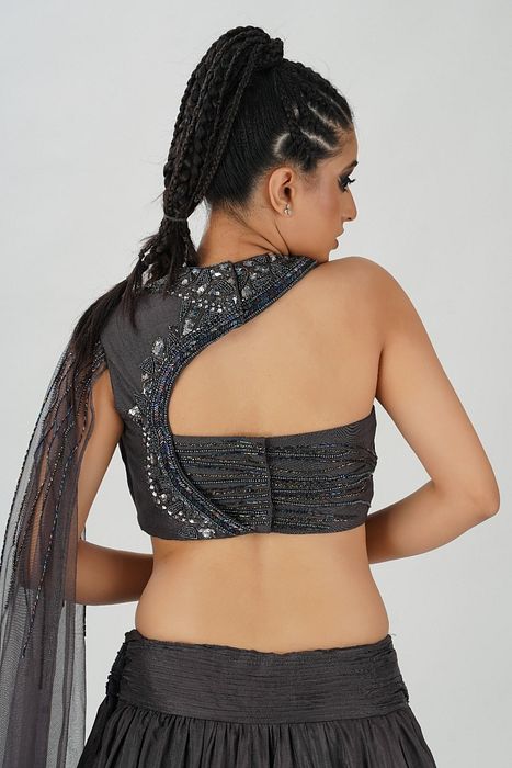 A model showcasing Lead Grey Cross Body Bustier Lehenga by Shruti S Label from Shruti S Label's collection
