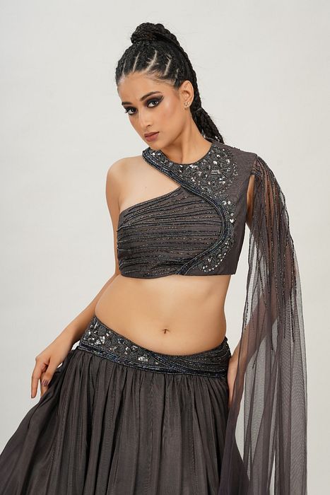 A model showcasing Lead Grey Cross Body Bustier Lehenga by Shruti S Label from Shruti S Label's collection