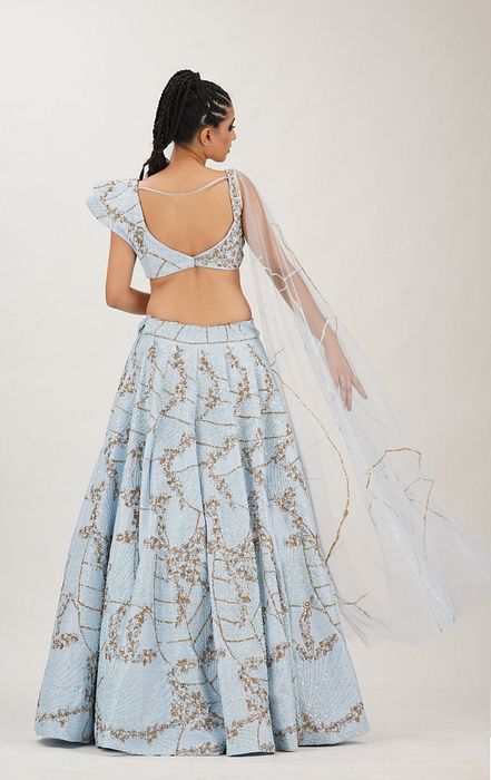A model showcasing Powder Blue Constructed Bustier Lehenga by Shruti S Label from Shruti S Label's collection