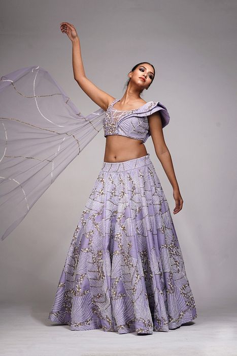A model showcasing Lavender Lehenga With Shruti S Collar by Shruti S Label from Shruti S Label's collection