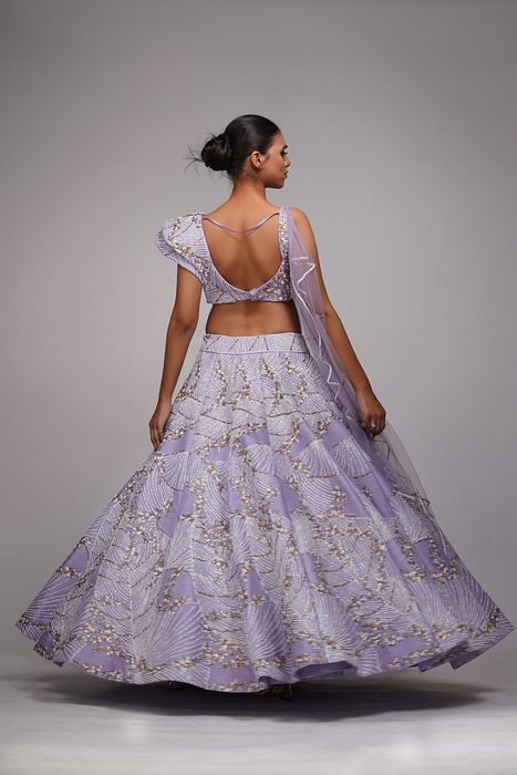 A model showcasing Lavender Lehenga With Shruti S Collar by Shruti S Label from Shruti S Label's collection