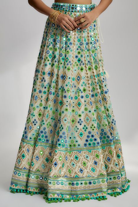 A model showcasing Ivory Avantika Lehenga by Gopi Vaid from Gopi Vaid's collection