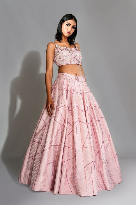 A model showcasing Pink Tone On Tone Lehenga With Sequins Work by Shruti S Label from Shruti S Label's collection