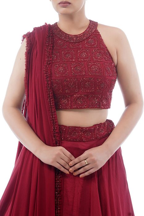 A model showcasing Halter Neck Blouse With Asymmetrical Circular Skirt by Shruti S Label from Shruti S Label's collection