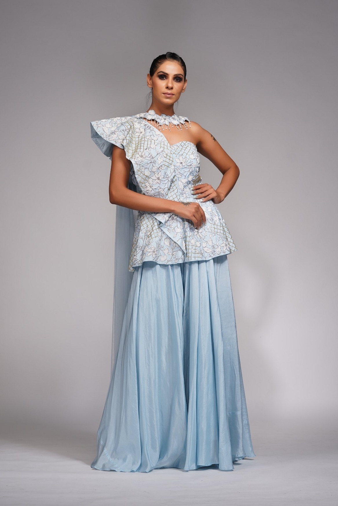 A model showcasing White Embroidery Peplum Sharara Feature image by Shruti S Label from Shruti S Label's collection