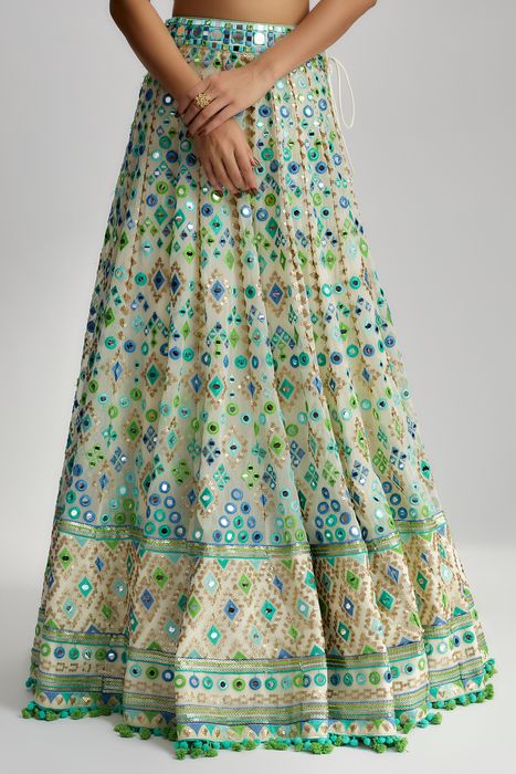 A model showcasing Ivory Vidhi Lehenga by Gopi Vaid from Gopi Vaid's collection