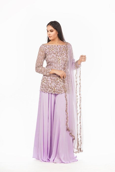 A model showcasing Bateau Neck Lavender Sharara Set by Shruti S Label from Shruti S Label's collection