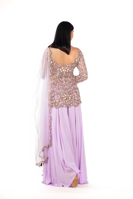 A model showcasing Bateau Neck Lavender Sharara Set by Shruti S Label from Shruti S Label's collection