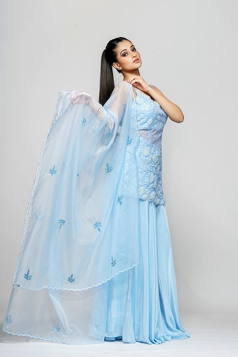 A model showcasing Ice Blue Cocktail Sharara by Shruti S Label from Shruti S Label's collection
