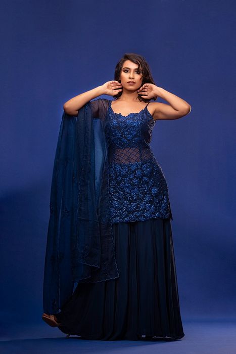 A model showcasing Navy Blue Cocktail Sharara by Shruti S Label from Shruti S Label's collection